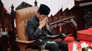 Deputi II Kepala Staf Kepresidenan, Abetnego Tarigan menjelaskan alasan Jokowi mengenakan pakaian adat Betawi sebagai simbol terima kasih untuk kota Jakarta sebagai ibu kota. (BAGUS INDAHONO / POOL / AFP)