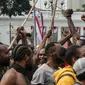 Warga Papua mengambil bagian dalam demonstrasi di depan istana kepresidenan di Jakarta pada 28 Agustus 2019. (AFP Photo/Bay Ismoyo)