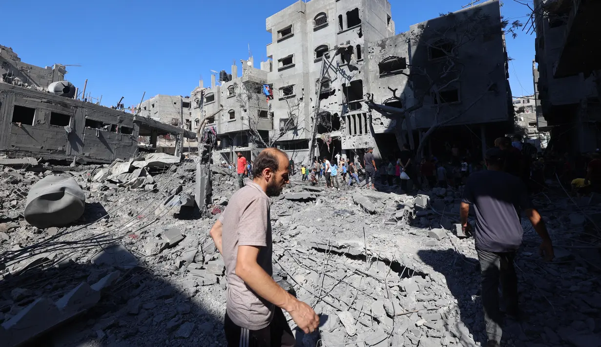 Di Gaza Tengah, empat orang tewas di kamp pengungsi al-Bureij ketika rumah sebuah keluarga menjadi sasaran serangan semalam. (Eyad BABA/AFP)