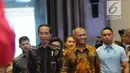 Presiden Joko Widodo (Jokowi) didampingi Ketua KPK Agus Rahardjo menghadiri Peringatan Hari Anti Korupsi Sedunia 2018 di Jakarta, Selasa (4/12). Acara ini mengambil tema Menuju Indonesia Bebas Dari Korupsi. (Liputan6.com/Angga Yuniar)