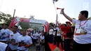 Menko PMK Puan Maharani bersama Ketua NASGOC, Erick Thohir melepas Fun Run menyemarakan Asian Games 2018 di Plaza Barat Senayan, Jakarta, Minggu (1/7). Acara digagas untuk menyambut Asian Games pada Agustus 2019 mendatang. (Liputan6.com/Johan Tallo)