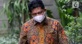 Kepala Badan Pelayanan Pajak Daerah (BPPD) Sidoarjo Ari Suryono kembali ke Gedung Merah Putih Komisi Pemberantasan Korupsi (KPK) Jakarta usai istirahat shalat Jumat (2/2/2024).  (Liputan6.com/Herman Zakharia)