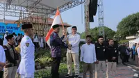 Kirab Pemilu Damai 2024 akhirnya tiba di Kota Tangerang, Banten. Pemkot Tangerang bersama dengan Komisi Pemilihan Umum (KPU) Kota Tangerang menggelarnya untuk Pemilu yang damai. (Liputan6.com/Pramita Tristiawati)