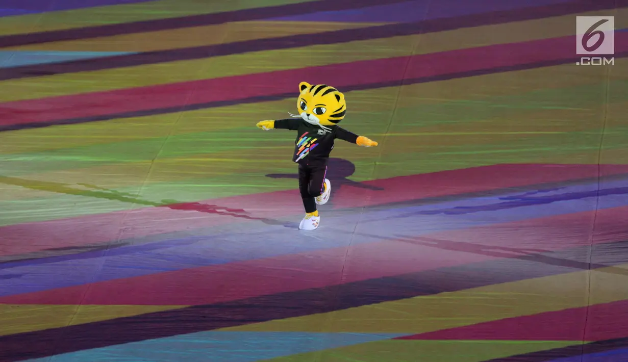 Maskot SEA Games Rimau beraksi saat penutupan SEA Games 2017 di Stadion Bukit Jalil, Malaysia, (30/8). Pesta olahraga negara-negara di Asia Tenggara resmi ditutup dan SEA Games selanjutnya akan digelar di Filipina pada 2019. (Liputan6.com/Faizal Fanani)