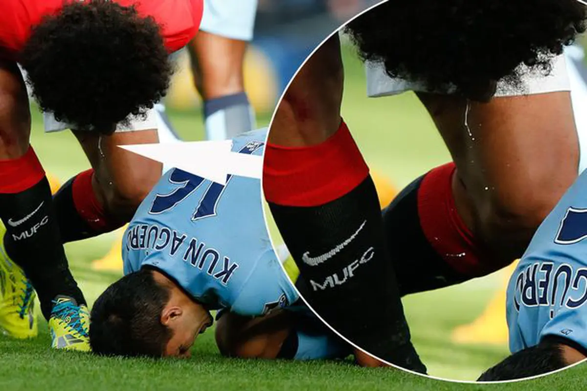 Marouane Fellaini dan Sergio Aguero