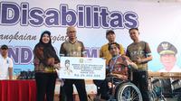 Ribuan penyandang disabilitas jalan sehat dan senam bersama dalam rangka menyambut HUT ke 343 Kota Bandar Lampung. Foto : (Istimewa).