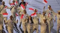 Capaian ini menempatkan Indonesia di posisi dua klasemen akhir SEA Games 2025 Thailand. Tampak dalam foto, perwakilan atlet Indonesia saat mengikuti parade upacara penutupan SEA Games 2025 di Rajamangala Stadium, Bangkok, Thailand, Sabtu (20/12/2025). (Bola.com/Bagaskara Lazuardi)