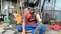 I Wayan Sumardana, tukang las asal Bali yang mengalami stroke ringan ini berubah jadi Iron Man!