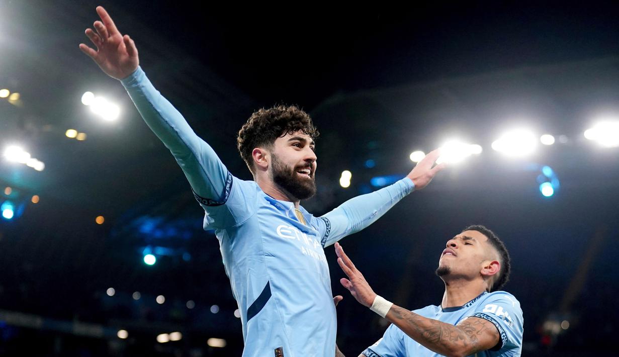 Sempat tertinggal akibat gol Raphael Onyedika, Man City bangkit dengan mencetak tiga gol, masing-masing lewat aksi Mateo Kovacic, bunuh diri Joel Ordonez, dan Savinho. (Mike Egerton/PA via AP)