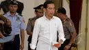 Presiden Joko Widodo saat akan memberikan keterangan pers usai menggelar pertemuan dengan pimpinan tiga lembaga hukum, Istana Merdeka, Jakarta, Rabu (25/2/2015). (Liputan6.com/Faizal Fanani)