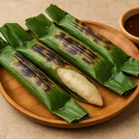 ilustrasi otak-otak khas bangka dengan kuah cuko tauco/image generated by AI