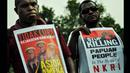 Sejumlah mahasiswa perwakilan Papua melakukan aksi solidaritas di depan Istana Merdeka, Jakarta, Selasa (31/3/2015). Mereka menolak pembangunan markas komando Brimob di Wamena. (Liputan6.com/Faizal Fanani) 