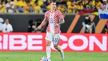 Luka Vuskovic dari Kroasia mengontrol bola saat pertandingan persahabatan internasional antara Kolombia dan Kroasia di Camping World Stadium pada 26 Maret 2026 di Orlando, Florida. (Julio Aguilar/ Getty Images melalui AFP)