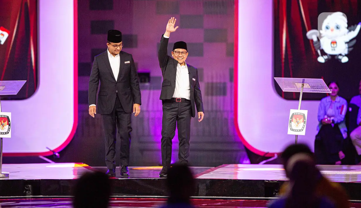 Pasangan nomor urut 1 Anies Baswedan-Muhaimin Iskandar mengenakan jas hitam dengan dalaman putih. (Liputan6.com/Faizal Fanani)
