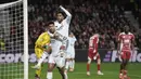 Real Madrid sukses mengalahkan Brest dengan skor telak 3-0 dalam laga matchday 8 League Phase Liga Champions 2024/2025 yang digelar di Stade de Roudourou, Kamis (30/1/2025) dini hari WIB. Sihir Rodrygo membawa Los Blancos meraih kemenangan sekaligus menjaga asa di Liga Champions. (AP Photo/Thibault Camus)