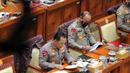 Kepala Kepolisian Negara Republik Indonesia (Kapolri) Jenderal Pol. Listyo Sigit Prabowo (kiri) saat mengikuti rapat dengar pendapat (RDP) dengan DPR RI di Jakarta, Rabu (24/8/2022). Rapat tersebut membahas kasus penembakan Brigadir J di rumah dinas Irjen Pol. Ferdy Sambo. (Liputan6.com/Angga Yuniar)