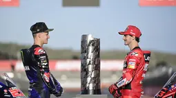 Namun kedua pembalap menegaskan tidak mau sombong. mereka menyebut MotoGP adalah dunia yang penuh kejutan. (AFP/Javier Soriano)