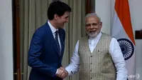 Perdana Menteri Narendra Modi mengatakan dia tidak akan mentolerir separatisme, sementara Justin Trudeau berusaha keras untuk menghilangkan persepsi di India bahwa Kanada miliknya adalah tempat yang aman bagi ekstremis Sikh. (Foto: AFP / Money Sharma)