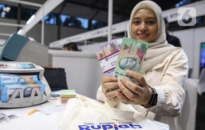 Untuk mendapatkan kuota penukaran uang rupiah baru, masyarakat harus mendaftar terlebih dahulu di aplikasi PINTAR BI. (Liputan6.com/Angga Yuniar)