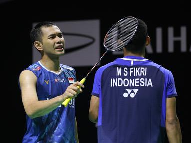 Ganda putra Indonesia, Fajar Alfian/Muhammad Fikri saat melawan Leo Carnando/Bagas Maulana dalam babak 16 besar Indonesia Masters 2026 di Istora Senayan, Jakarta, Kamis (22/1/2026). (Bola.com/M Iqbal Ichsan)