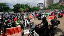 Sebanyak 12 tempat parkir disiapkan di sekitar lokasi uji coba larangan melintas kendaraan roda dua di sepanjang Bundaran HI-Jl Medan Merdeka Barat, mulai 17 Desember mendatang, Jakarta, Kamis (4/12/2014). (Liputan6.com/Johan Tallo)