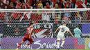 Pemain Irak, Osama Rashid, mencetak gol ke gawang Indonesia pada laga perdana Grup D Piala Asia 2023 di Ahmed bin Ali Stadium, Senin (15/01/2024). (AFP/Karim Jaafar)
