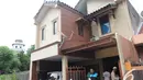 Fahrurrozi kini tinggal di Jalan Jatinegara Timur III, nomor 8, RT 04/RW 04 Kelurahan Rawabunga, Jatinegara, Jakarta Timur. Ia menjadikan rumahnya sebagai kantor gubernur. Foto diambil pada Rabu (3/12/2014). (Liputan6.com/Herman Zakharia) 