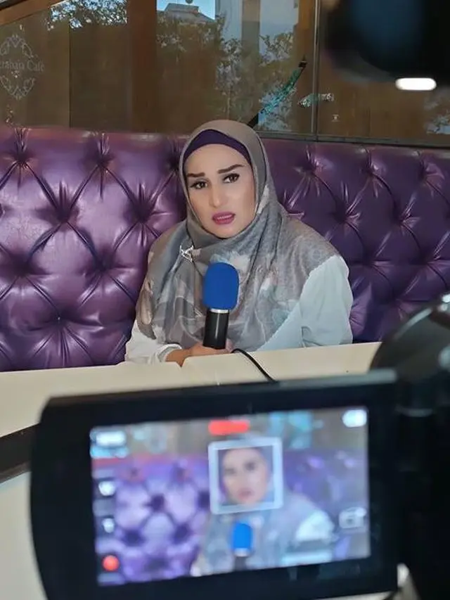 Rita Hasan berhijab
