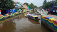 Kampung Mural Palembang di Tepian Sungai Beraroma Menyengat