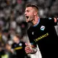 Gelandang Lazio Sergej Milinkovic-Savic masuk dalam daftar pemain yang ingin dibeli Manchester United atau MU pada bursa transfer musim panas 2022. (MARCO BERTORELLO / AFP)