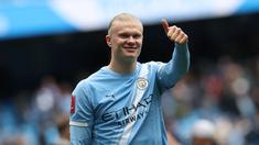 Penyerang Manchester City, Erling Haaland girang bukan kepalang usai membawa timnya mengalahkan Liverpool di perempat final FA Cup di Etihad Stadium, Sabtu (4/4/2026). (AFP/Darren Staples)