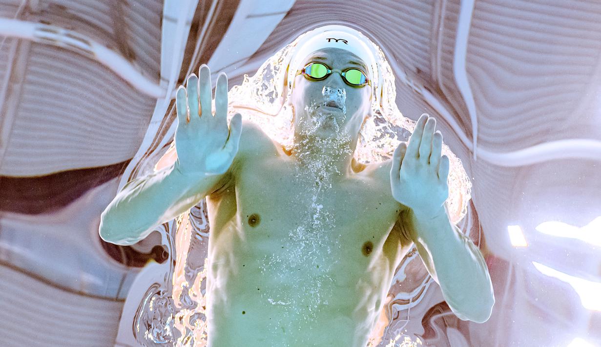 Perenang Prncis, Leon Marchand, saat beraksi pada ajang World Aquatics Championships di Budapest, Hungaria, Rabu (22/6/2022). (AFP/François-Xavier Marit)