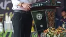 Menteri Hukum dan HAM Yasonna Laoly memberi sambutan saat memantau proses perekaman E-KTP bagi warga binaan di Lapas Narkotika IIA Cipinang, Jakarta, Kamis (17/1). (Merdeka.com/Imam Buhori)