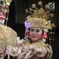 Penari membawakan tarian Gending Sriwijaya pada acara Festival Putri Bumi Sriwijaya (PBS) yang diselenggarakan Indonesia Tionghoa di Jakarta, Kamis (29/3). Pagelaran ini difokuskan pada potensi budaya Sumatera bagian Selatan. (Liputan6.com/Pool/Agus)