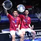 Ganda putra Indonesia, Kevin Sanjaya/Marcus Gideon, merebut gelar All England 2017 setelah mengalahkan pasangan China, Li Junhui/Liu Yuchen. Pada partai final, Minggu (12/3/2017), Kevin/Marcus menang dua gim 21-19 dan 21-14. (AFP/Justin Tallis)