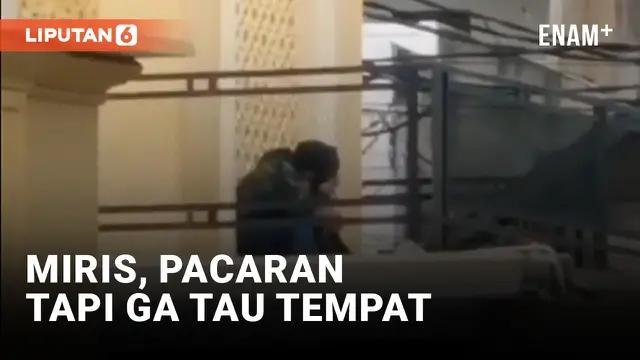 Pasangan Sejoli Bermesraan di Atas Masjid