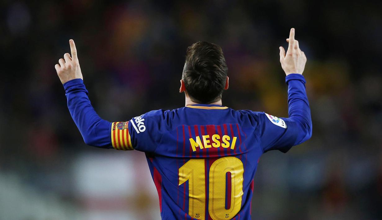 Striker Barcelona, Lionel Messi, melakukan selebrasi usai mencetak gol ke gawang Leganes pada laga La Liga di Stadion Camp Nou, Sabtu (7/4/2018). Barcelona menang 3-1 atas Leganes. (AP/Manu Fernandez)