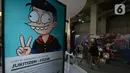 Pengunjung mengunjungi pameran karakter Juki  di Sarinah Jakarta Jumat (10/6/2022). Pameran digital painting bertajuk "Si Juki In  Painting Universe" merupakan eksperimen Faza dalam mengeksplorasi seni Digital Painting dan apresiasi terhadap karya-karya seni rupa yang melegenda. (merdeka.com/Imam Buhori)