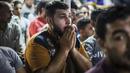Wajah sedih fans Mesir setelah timnya kalah dari Rusia pada Piala Dunia 2018 di Nile delta village, Nagrig, Mesir, (19/6/2018). Rusia menang 3-1.  (AP/Islam Safwat)
