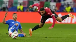 Italia sukses mengalahkan Albania dengan skor tipis 2-1.  (AP Photo/Frank Augstein)