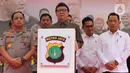 Menpan RB Tjahjo Kumolo memberikan sambutan saat rilis pemusnahan narkoba di Mapolda Metro Jaya, Rabu (19/2/2020). Barang bukti tersebut merupakan hasil temuan dijajaran Polres selama bulan Januari 2020 seperti sabu, ganja, esktasi, heroin, happy five dan gorilla. (Liputan6.com/Herman Zakharia)