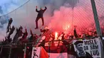 Suporter Timnas Bosnia dan Herzegovina merayakan kemenangan atas Italia pada final play-off kualifikasi Piala Dunia 2026 zona Eropa melawan Italia di Stadion Bilino Polje, Zenica, Selasa 31 Maret 2026 waktu setempat atau Rabu 1 April 2026 dini hari WIB. Bosnia dan Herzegovina memastikan tiket berlaga di ajang Piala Dunia 2026. (Elvis BARUKCIC/AFP)