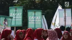 Badan Amil Zakat Nasional (Baznas) melakukan pawai simpatik menyambut Ramadan 1440 Hijriah di Patung Kuda, Jakarta, Jumat (3/5/2019). Dalam aksinya, Baznas menyerukan kewajiban membayar zakat, mengingat Ramadan semakin dekat. (merdeka.com/Imam Buhori)