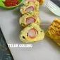 Resep telur gulung Jepang alias tamago roll isi crab stick. (dok. Cookpad @anda_rani)