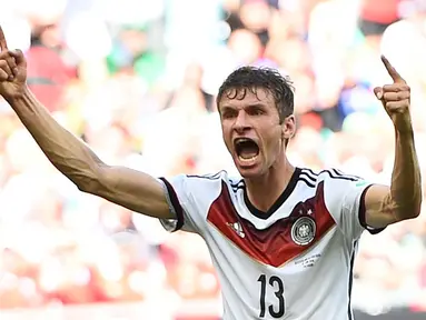 Gelandang Timnas Jerman, Thomas Mueller, menjadi pemain pertama yang mencetak hattrick di Piala Dunia 2014, (16/6/2014). (REUTERS/Dylan Martinez)