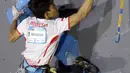 Atlet panjat tebing putra Indonesia, Raviandi Ramadhan saat berlaga di babak final kategori lead Kejuaraan Dunia Panjat Tebing 2022 seri Jakarta, Senin (26/9/2022). Raviandi Ramadhan menjadi satu-satunya wakil Indonesia di babak final lead putra Kejuaraan Dunia Panjat Tebing 2022 seri Jakarta. (Liputan6.com/Helmi Fithriansyah)