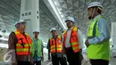 Terminal 3 Ultimate yang ditargetkan selesai eai 2016 ini memiliki kapasitas 25 juta penumpang per tahun, Tangerang, Banten, Rabu (27/1/2016). Terminal ini akan melayani penerbangan internasional dan domestik. (Liputan6.com/Faisal R Syam)  