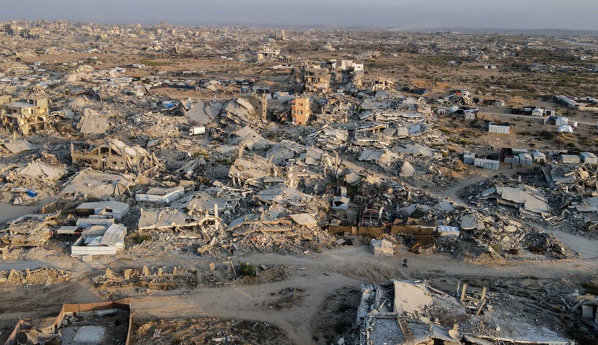 Foto udara ini menunjukkan bangunan-bangunan yang hancur di kawasan Al-Remal, Kota Gaza, pada 23 Oktober 2025. (Foto oleh AFP)
