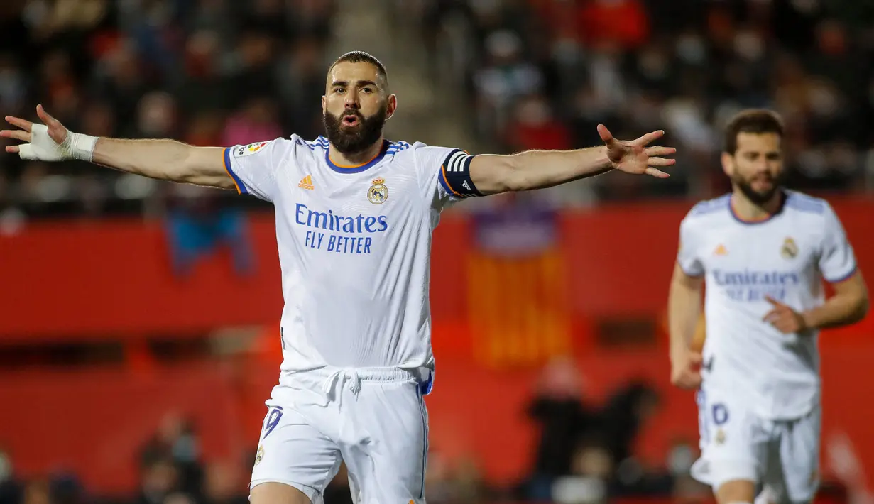 Diusianya yang sudah tidak muda, tapi perolehan gol Benzema justru kian banyak. Musim ini, ia sudah membukukan 32 gol dari 34 penampilan di semua kompetisi. (AFP/Jaime Reina)
