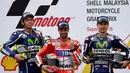 Tambahan 36 poin membuat Movistar Yamaha menggusur Repsol Honda dari puncak klasemen sementara tim MotoGP 2016. (AFP/Manan Vatsyayana)